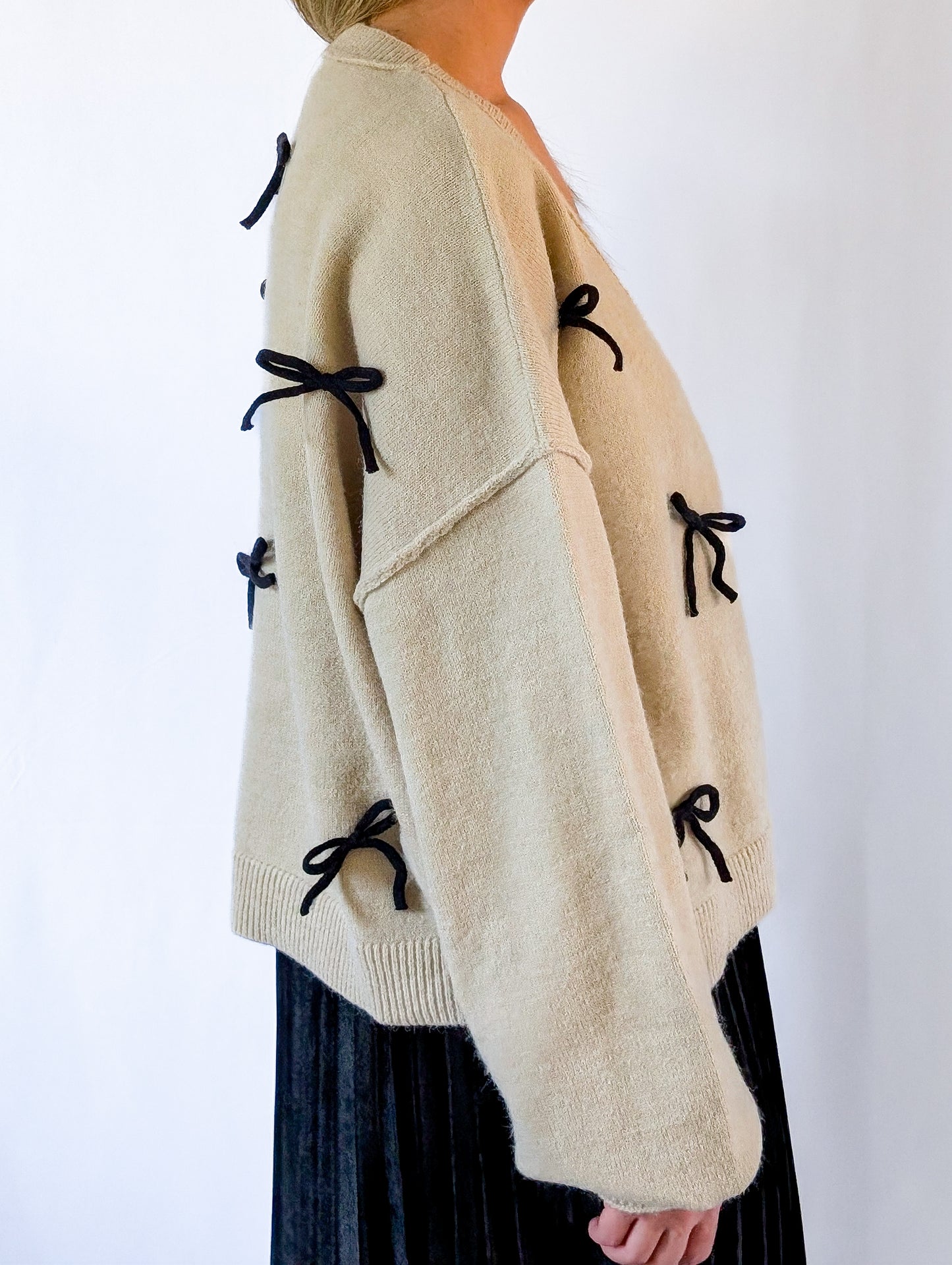 All Over Bow Cardigan Sweater